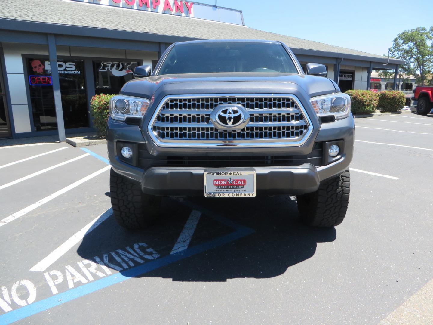 2017 CHARCOAL /GREY Toyota Tacoma TRD OFF-ROAD Double Cab Long Bed V6 6AT 4WD (3TMDZ5BN3HM) with an 3.5L V6 engine, automatic transmission, located at 2630 Grass Valley Highway, Auburn, CA, 95603, (530) 508-5100, 38.937893, -121.095482 - TRD Off-road Tacoma with a level kit, 17" Fuel Vector wheels, Falken Wildpeak AT tires, N-Fab running boards, Roll Up tonneau cover, BedRug, and window Deflectors. - Photo#1